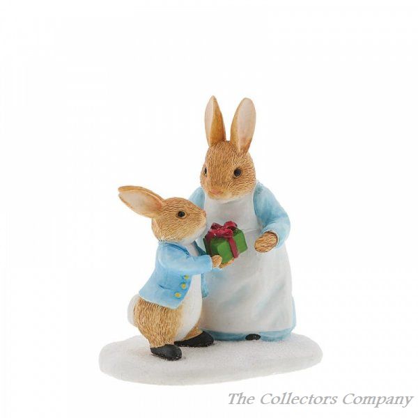 Mrs Rabbit Passing Peter Rabbit a Present Figurine A30256