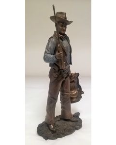 John Wayne Bronze Figure Standing with gun and saddle 60349
